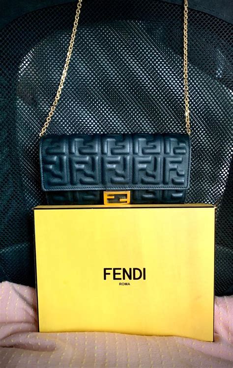 fendi baguette woc|baguette continental wallet with chain.